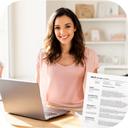 Maria G. standing in a bright home office with a laptop and printed resume nearby